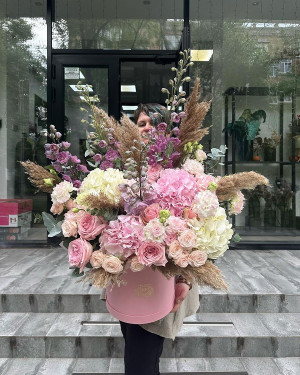 Flowers in a Pink Box with White Hydrangea